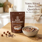 Iswari Super Petit Déjeuner Cacao Noisettes 360g avec porridge et noisettes sur table en bois