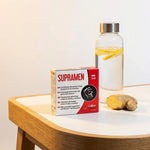 Supramen 10 gélules Labophyto boîte rouge blanc sur bureau avec gingembre frais
