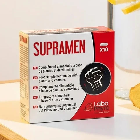 Supramen 10 gélules Labophyto boîte rouge blanc sur bureau avec gingembre frais