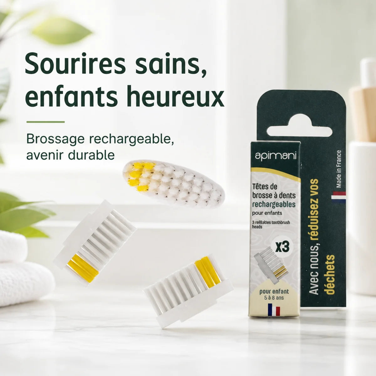 Têtes brosse à dents rechargeable Apimani enfant avec emballage et recharges sur fond blanc minimaliste
