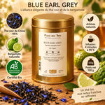 Thé noir Blue Earl Grey Bio 100g avec feuilles de thé et fleurs de bleuet sur fond bois