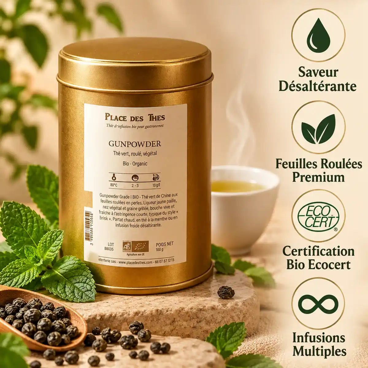 Thé vert Gunpowder Bio 100g Place des Thés en boîte dorée avec tasse et feuilles de menthe