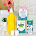 Bouteille Rechargeable Jaune Flacon Vide 264 Ml Anotherway posée à côté de pastilles à diluer
