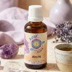 Flacon Ansil Zéolite 30ml élixir cristal entouré de cristaux naturels et herbes, ambiance bien-être