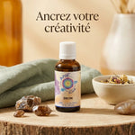 Flacon Ansil Zircon élixir de cristal 30ml sur bois avec cristaux et ambiance bien-être minimaliste